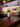 Paper Plane Prebatch Erasmus Collection – Flasche und Coupe-Glas an der Bar