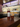 Amaretto Sour Prebatch Erasmus Collection – Flasche und Tumbler an der Bar