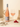 Weingut Stefan Müller × Erasmus Rosé – Flasche und Glas im Sonnenlicht